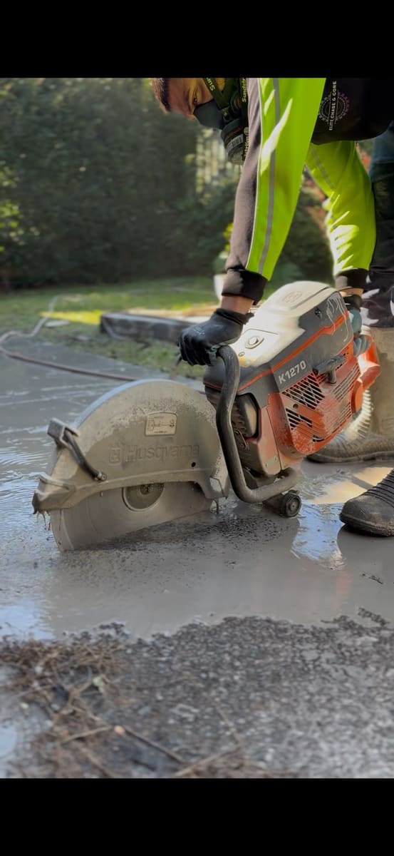 Cutting a concrete slab with a cut-off saw, Sydney