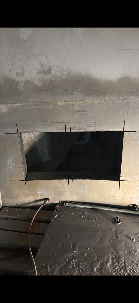 Opening cut through a concrete wall with a wall saw, Sydney