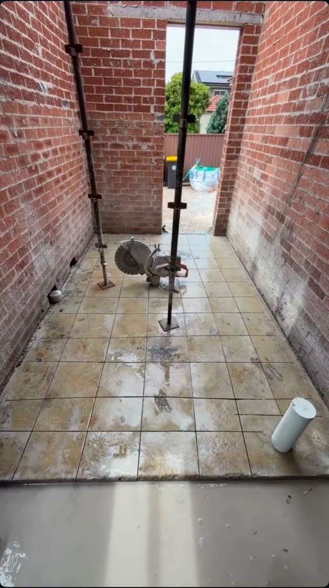 Narrow access between brick walls on an Eastern Suburbs job